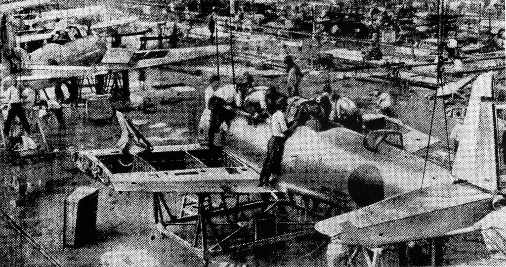 Workers assemble aircraft at a Nakajima aircraft factory