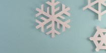 White snowflake on blue background