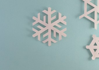 White snowflake on blue background